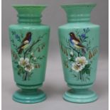 A pair of Victorian pale blue glass enamelled vases