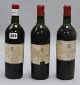 Three bottles of Chateau Pape Clement 1955
