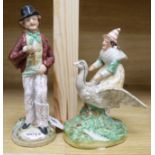 A Staffordshire double 'Gin' and 'Water' figure and another of a witch riding a goose