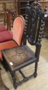 A late Victorian Carolean style oak wood seat dining chair and a small Victorian upholstered