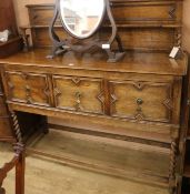 A 1920's oak sideboard, W.138cm