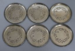 A set of six Georg Jensen silver glass coasters, design no. 51B, 9cm.