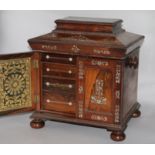 A Victorian mother of pearl-inlaid rosewood work-cum-stationery cabinet, fitted compartment and