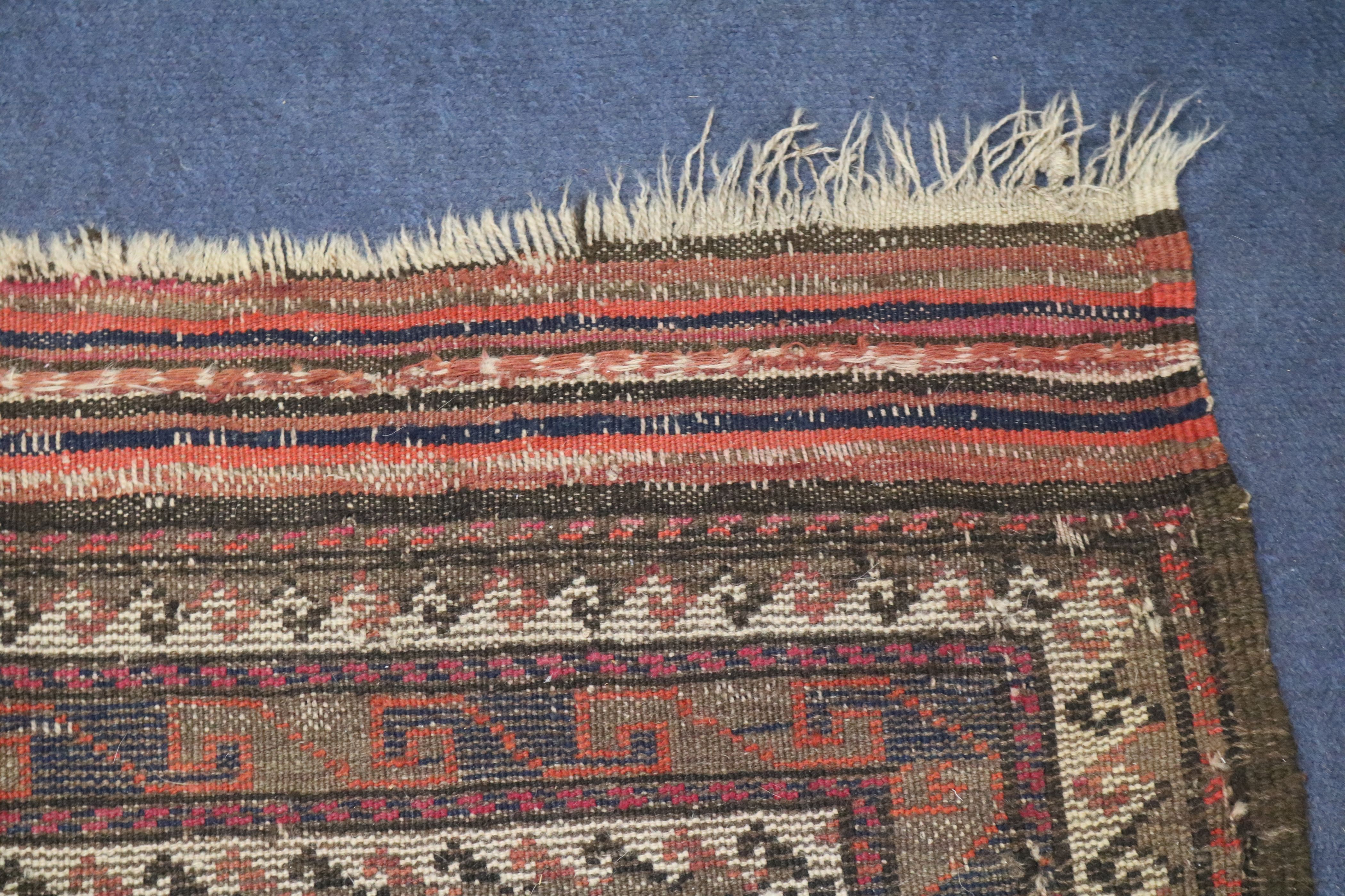A Shiraz rug, a Bokhara saddlecloth and another rug (wear) 200 x 155cm, 120 x 75cm & 140 x 85cm - Image 5 of 11