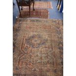 A Shiraz rug, a Bokhara saddlecloth and another rug (wear) 200 x 155cm, 120 x 75cm & 140 x 85cm