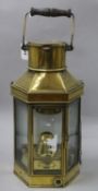 A pair of early Victorian glass lustre drop candlesticks and a brass-cased angled ship's bulkhead