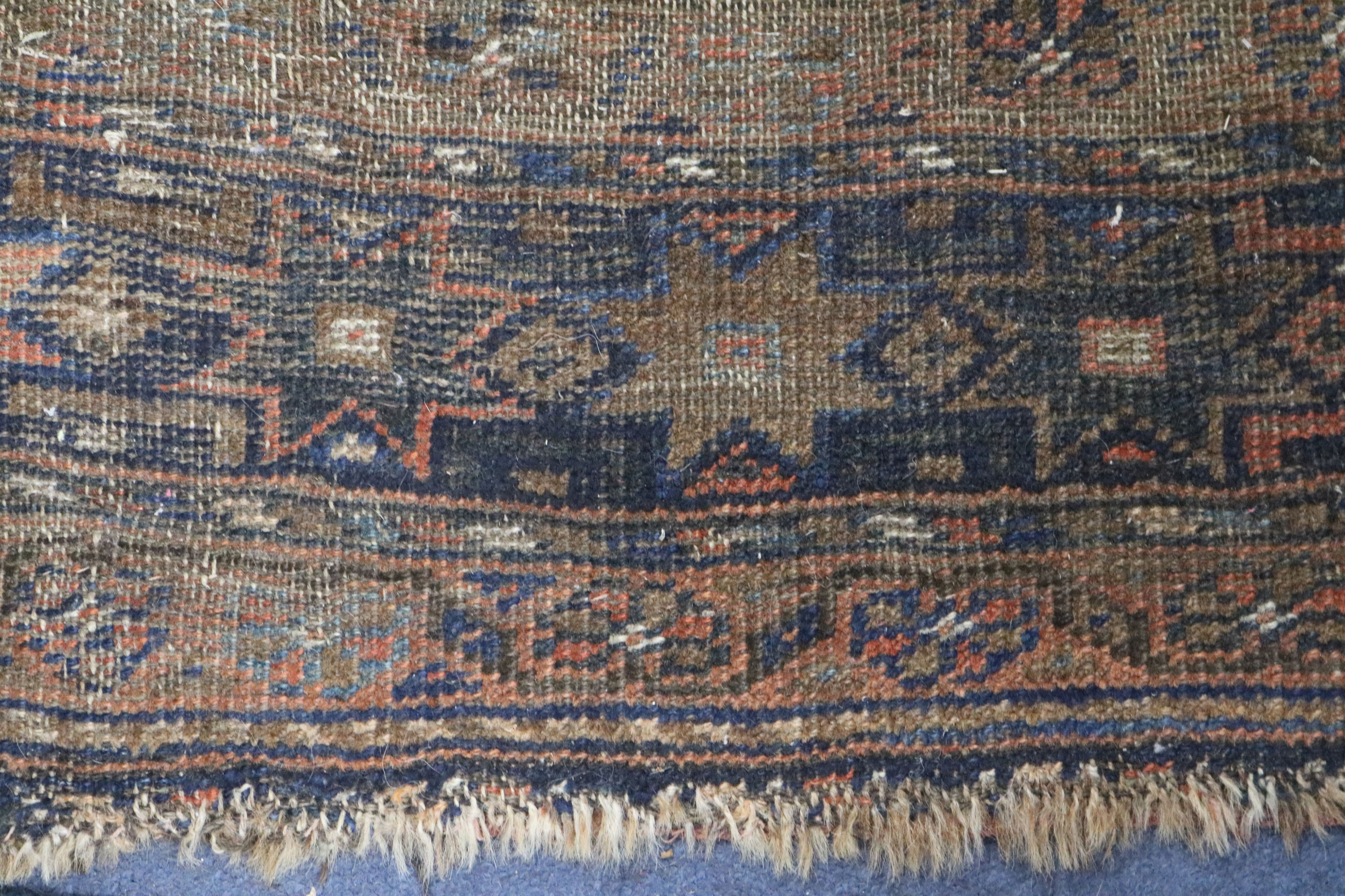 A Shiraz rug, a Bokhara saddlecloth and another rug (wear) 200 x 155cm, 120 x 75cm & 140 x 85cm - Image 9 of 11