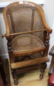 An early Victorian mahogany child's high chair