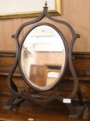 A mahogany skeleteon frame toilet mirror, W.56cm