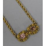 A gem-set yellow metal ropetwist necklace (converted from a pair of earrings).