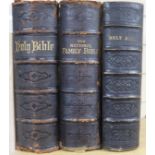 Three leather bound family bibles