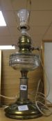 A Victorian brass and glass oil lamp