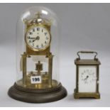 A French late 19th century gilt-brass carriage timepiece, H 5.75in and a brass torsion mantel