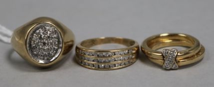 A 9ct gold and small diamond 'kiss' ring and two other 9ct gold and diamond rings, gross 12.7gr