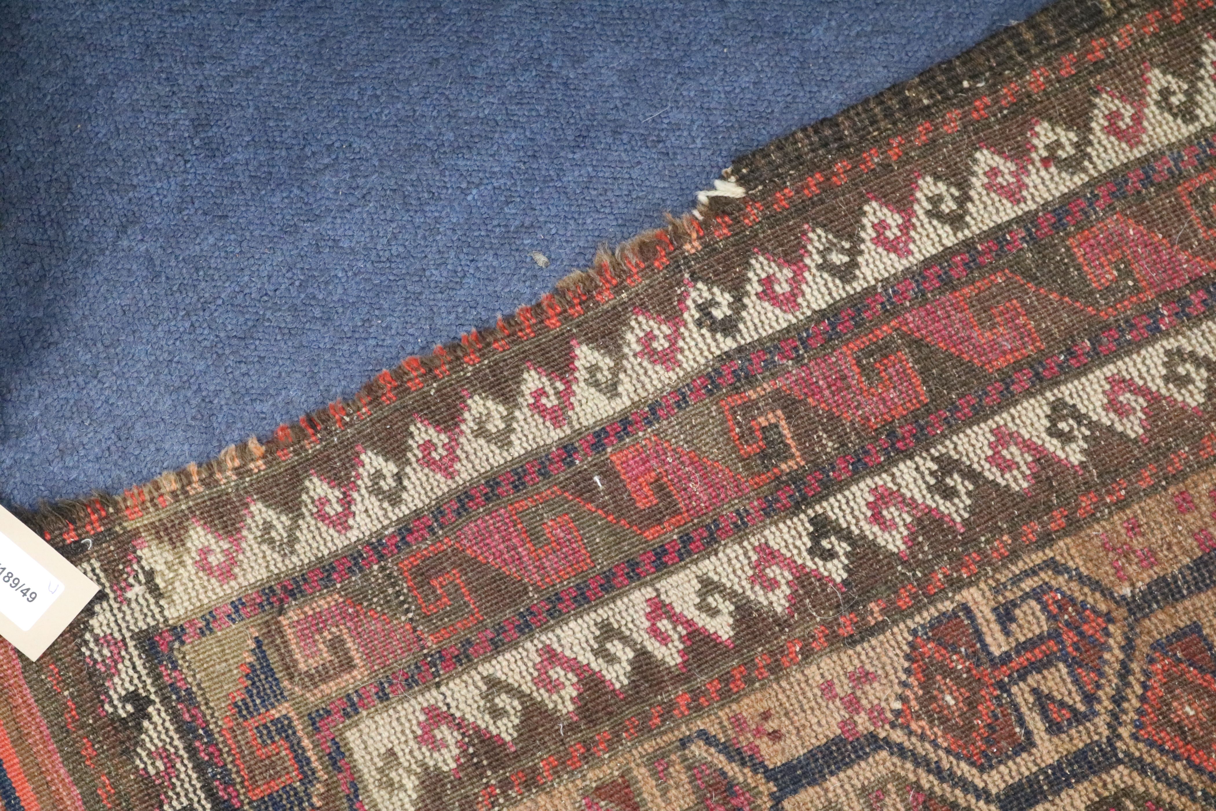 A Shiraz rug, a Bokhara saddlecloth and another rug (wear) 200 x 155cm, 120 x 75cm & 140 x 85cm - Image 4 of 11