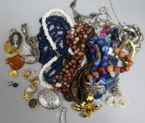 A quantity of silver and costume jewellery, including an enclosed locket and an Art Nouveau style