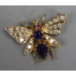 A modern 9ct gold amethyst, ruby and diamond butterfly brooch, 26mm.