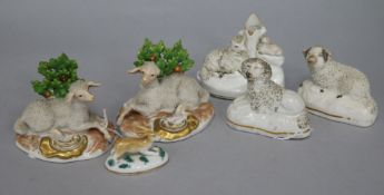 A pair of Samson porcelain sheep bocage figures, a similar hare, a Staffordshire recumbent sheep and