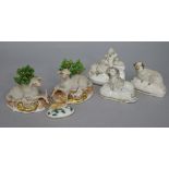 A pair of Samson porcelain sheep bocage figures, a similar hare, a Staffordshire recumbent sheep and