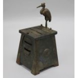 A copper Arts and Crafts cigarette dispenser, possibly Liberty & Co