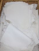 A linen cutwork place mat, runner and napkin set