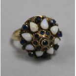 An 18ct gold, opal and sapphire cluster ring, size P.