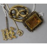 A Victorian yellow metal openwork brooch, a similar citrine brooch and two pearl set yellow metal