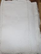 A linen embroidered banqueting cloth and napkin set