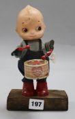 A toy wind up drummer boy / doll