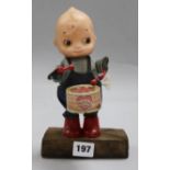 A toy wind up drummer boy / doll