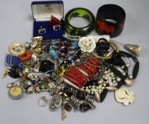 A group of costume jewellery including stylish 1970's plastic bangles etc.