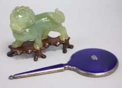 A hardstone Chinese lion and enamel mirror