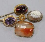 Three stick pins including one Edwardian 15ct gold and diamond and two brooches including one 9ct