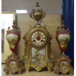 A gilt spelter and porcelain mounted clock garniture