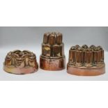 Three Victorian castellated copper jelly moulds