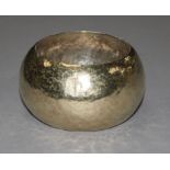 A modern planished heavy silver gilt bangle, 137 grams.