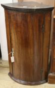 A late George III mahogany corner cupboard, H.90cm