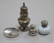 A George V silver "acorn" pepperette by Saunders & Shepherd, a silver mounted glass scent bottle,