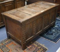 A 17th century oak coffer, W.137cm