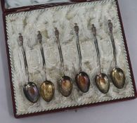 A set of 6 Chinese silver coffee spoons with mandarin finials, stamped S.W 85.