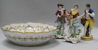 Three figurines and a large bowl