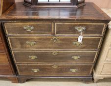 An 18th century oak and walnut chest of drawers, W.95cm