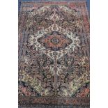 A Persian blue and pink ground medallion rug 190 x 130cm