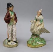 A Staffordshire double 'Gin' and 'Water' figure and another of a witch riding a goose