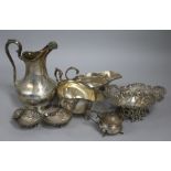 A Victorian engraved silver cream jug, two silver sauceboats, a pierced silver bonbon dish, two