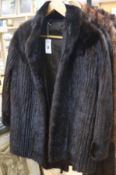 A brown stranded mink jacket