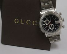 A gentleman's boxed stainless steel Gucci Chronoscope wrist watch.