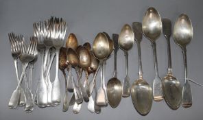 A quantity of mainly 19th century silver fiddle pattern flatware, various dates and makers, 40.5