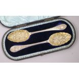 A cased pair of Victorian 'berry' spoons, Walker & Hall, Sheffield, 1888, 5.5 oz.