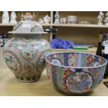 A Chinese lidded ceramic vase and a Japanese Imari ceramic bowl